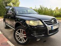Volkswagen Touareg 3.0 TDI KING KONG PIEL BEIGE-BIXENON-4X4-NAVI DVD-FULLL de 2009 con 233.000 Km por 9.700 EUR. en Granada