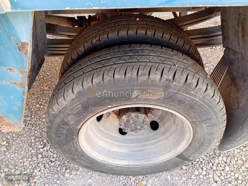 Nissan Atleon 110 CAJA FRUTERA O PAQUETERA. de 2001 con 345.000 Km por 7.000 EUR. en Murcia